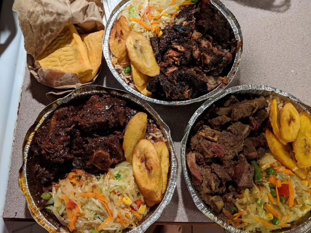 Curry Goat Jerk Chicken and Ox Tails